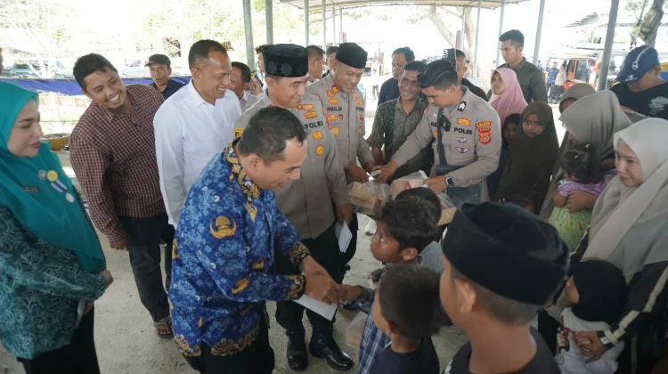 Kapolres Lhokseumawe Hadiri Khanduri Waduk Pusong dan Santuni Anak Yatim