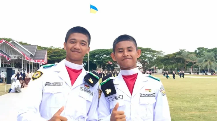 Dua Santri Misbahul Ulum Siap Kibarkan Merah Putih di HUT RI ke-81 Kota Lhokseumawe