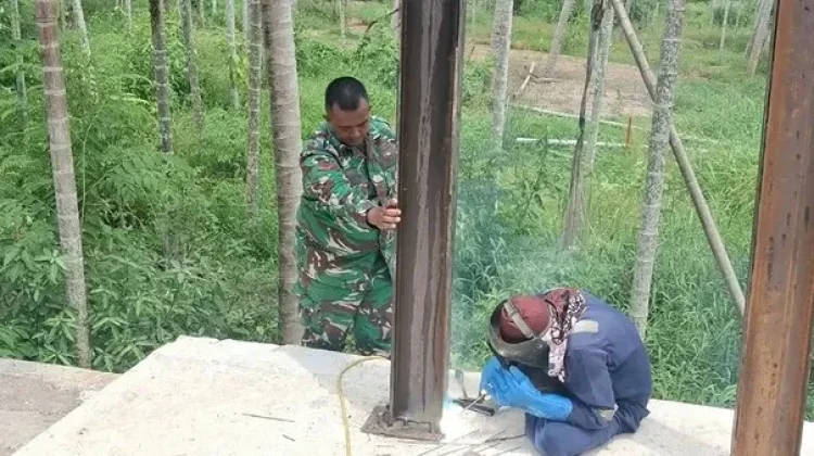 Kodim 0103/Aut Pacu Pembangunan Jembatan Perintis di Sawang