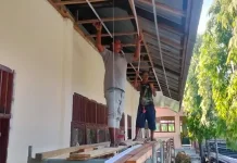 Babinsa Kodim 0103/Aceh Utara Kawal Rehabilitasi SD Negeri 4 Muara Dua Lhokseumawe