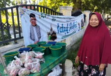 Harum Bunga Makam Hidupi Harapan Aminah