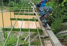 Jembatan Gantung Penghubung Tiga Dusun di Sawang Terus Dipacu