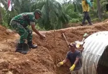 Babinsa Dampingi Pembangunan Jembatan Aramco di Desa Cot Girek