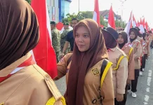 Langkah Perdana Siswi SMK N 4 Lhokseumawe Kirab Merah Putih 2026