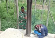 Kodim 0103/Aut Pacu Pembangunan Jembatan Perintis di Sawang