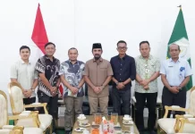 Bulog Bersama Bupati Al- Farlaky Bahas Sinergi Distribusi Beras
