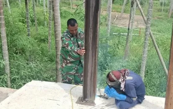Kodim 0103/Aut Pacu Pembangunan Jembatan Perintis di Sawang