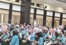 Unik, Jemaah Asal Sulawesi Tenggara Kompok Kenakan Sorban saat Kembali ke Tanah Air