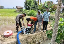 Kapolsek Telluwanua turut Pantau Pemberian Pompa Air untuk Petani