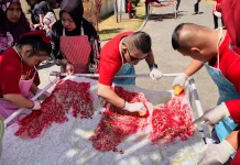 Belasan Anak Down Syndrome Ciptakan Batik Motif Tanpa Batas