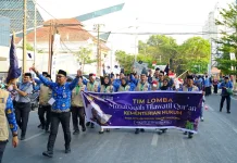Defile Kafilah Kementerian Hukum Ramaikan Pawai Ta'aruf MTQ KORPRI VIII Nasional
