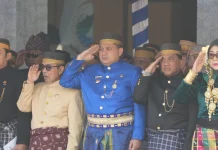 Kenakan Busana Adat Makassar, Wali Kota Munafri Hadiri HUT Sulbar ke-22
