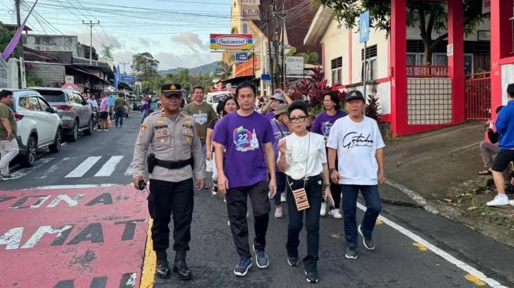 Kapolsek Pineleng Pimpin Pengamanan Jalan Sehat Jemaat GMIM Kalvari Pineleng