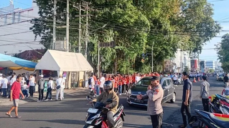 Polsek Wenang Lakukan Pengamanan Kegiatan Jalan Sehat Jemaat GPDI