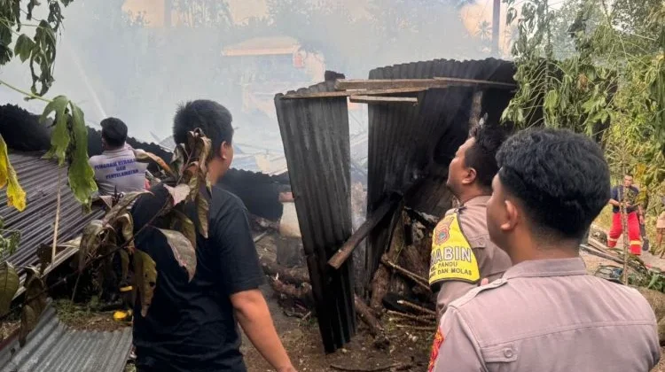 Polsek Bunaken Bergerak Cepat Amankan TKP Kebakaran Rumah di Bailang