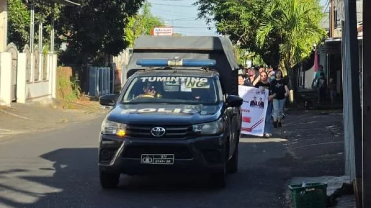 Polsek Tuminting Lakukan Pengamanan Jalan Sehat dan Pengabdian Masyarakat PPNI