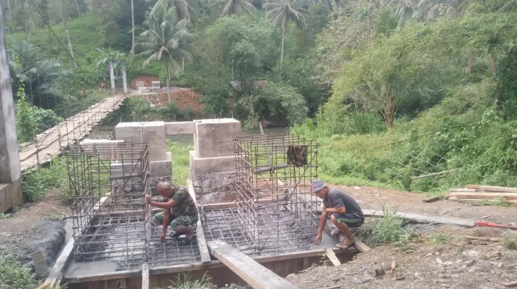 Pembangunan Jembatan Perintis Garuda di Ranoyapo Terus Berjalan Meski Hujan