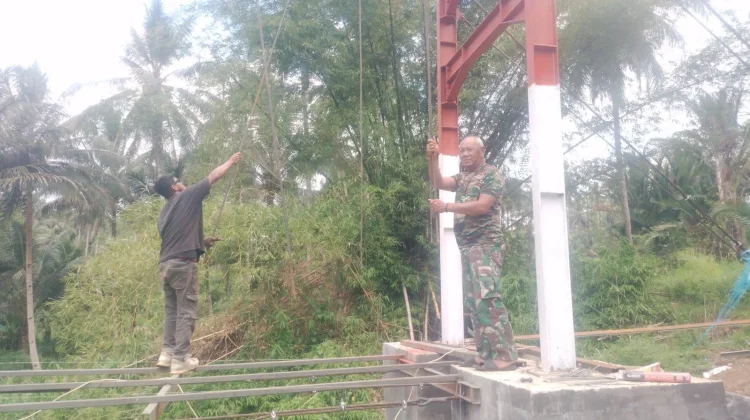 Babinsa Kodim 1302 Kawal Pembangunan Jembatan Garuda Ranoyapo Capai 75,50 Persen