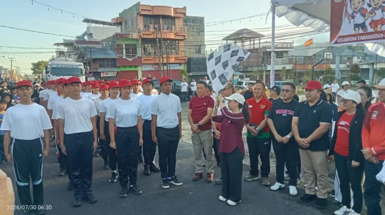 Wabup Vanda Buka Semarak HUT Ke-81 RI Kawangkoan Raya dengan Jalan Sehat
