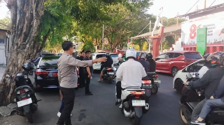 Polsek Tikala Lakukan Pengamanan Upacara HUT Pramuka ke-65 di Lapangan Tikala