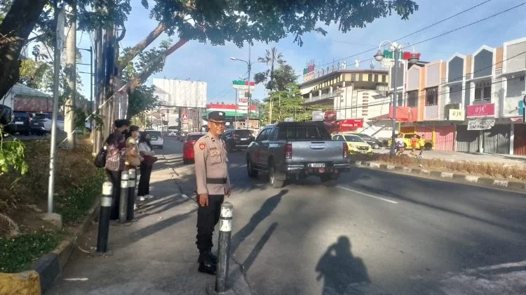 Pos Cakalang Polsek Mapanget Hadir di Jam Sibuk, Arus Lalu Lintas Tetap Lancar