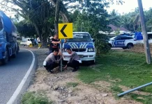Satlantas Polres Kotamobagu Pasang Rambu Peringatan di Ruas Jalan AKD Lobong