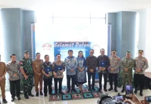 Kapolres Kotamobagu Dampingi Gubernur Sulut Serahkan Bantuan Mobil Kepada GMIBM