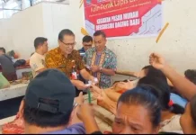 Jelang Paskah, Pemkab Minut Bagikan Kupon Daging Babi di Pasar Airmadidi