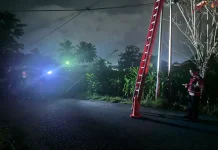 Personel Polsek Kotamobagu Amankan Lokasi Kabel Terbakar di Pertigaan Cempaka