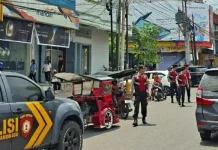 Jaga Lalu Lintas Tim Pantera Polres Kotamobagu Siaga di Pusat Pertokoan