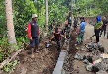 Satgas TMMD ke-128 Kodim 1302/Minahasa Percepat Pembangunan Talud di Watuliney