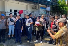 Personel Polresta Manado Amankan Eksekusi Pengadilan Negeri Manado