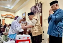 Kemenhaj Sulut Serahkan Barang Milik Jemaah Haji Wafat kepada Keluarga