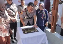 Polres Kotamobagu Wujudkan Kepedulian melalui Program Air Bersih dan RTLH