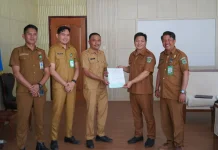Wabup Bolmong Serahkan SK Plt Empat Pejabat untuk Perkuat Layanan