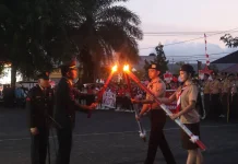 Dandim Minahasa Pimpin Taptu dan Pawai Obor HUT ke-81 RI