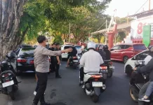 Polsek Tikala Lakukan Pengamanan Upacara HUT Pramuka ke-65 di Lapangan Tikala