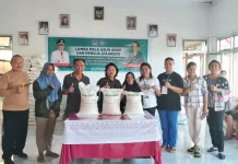 Polsek Bunaken Kawal Penyaluran Bantuan Pangan Nasional di Kelurahan Meras