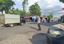 Pos cakalang Polsek Bunaken, Ciptakan Tertib Berlalu Lintas di Perempatan Pandu