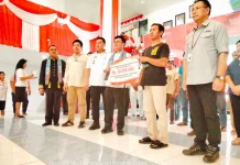 Pemkab Minut Salurkan Bantuan RTLH dan Rehabilitasi Rumah Korban Bencana