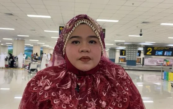 Pakaian Bugis Warnai Kepulangan Jemaah Haji Sulut