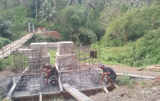 Pembangunan Jembatan Perintis Garuda di Ranoyapo Terus Berjalan Meski Hujan