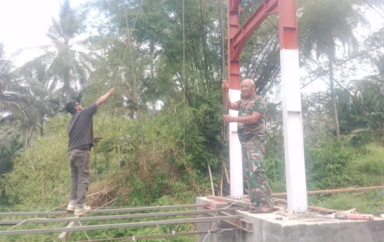 Babinsa Kodim 1302 Kawal Pembangunan Jembatan Garuda Ranoyapo Capai 75,50 Persen