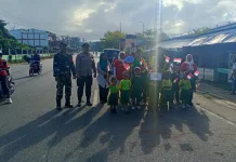 Sinergi TNI Polri Amankan Jalan Santai Siswa Manimeri