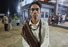 OMK Santo Thomas Aquinas Amban Arak Salib IYD ke Lingkungan dan Stasi