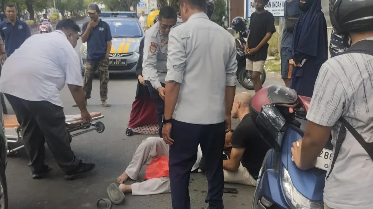 Pengendara Motor Terjatuh Usai Terjerat Benang Layangan di Jalan Majapahit