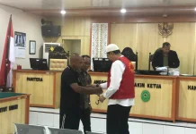 Anggota Polsek Pemenang Diminta Didik Bawa Koper Berisi Uang ke Panin Bank