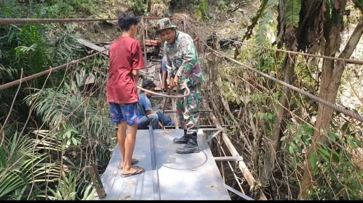 Rampungkan Rehabilitasi Jembatan Gantung di Desa Halimbe Labura