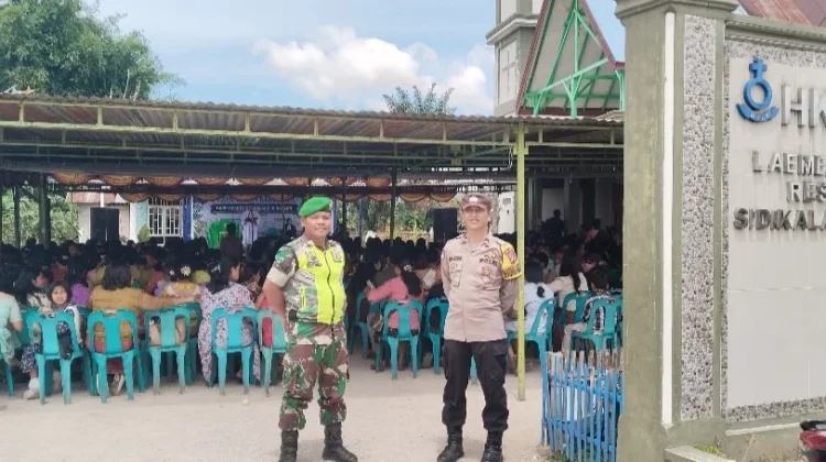 Babinsa dan Bhabinkamtibmas Laksanakan Pengamanan Kegiatan Ibadah
