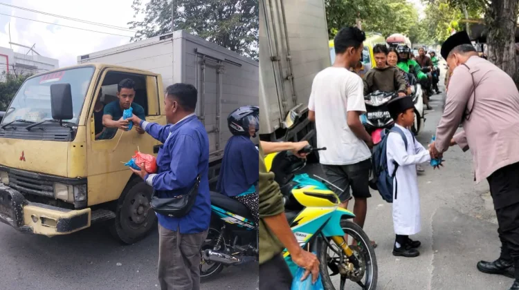 Polsek Sunggal Bagikan Makanan kepada Warga di Jalan TB Simatupang